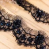 Ruban dentelle de Calais® perlée Camelia 60 mm - noir x 50cm
