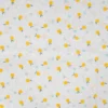 Tissu voile de coton plumetis Citrons - écru